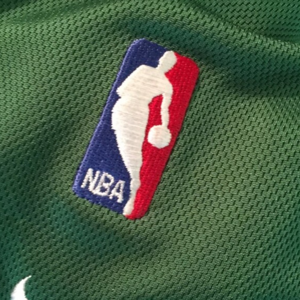Warm-up jersey signed by Larry bird